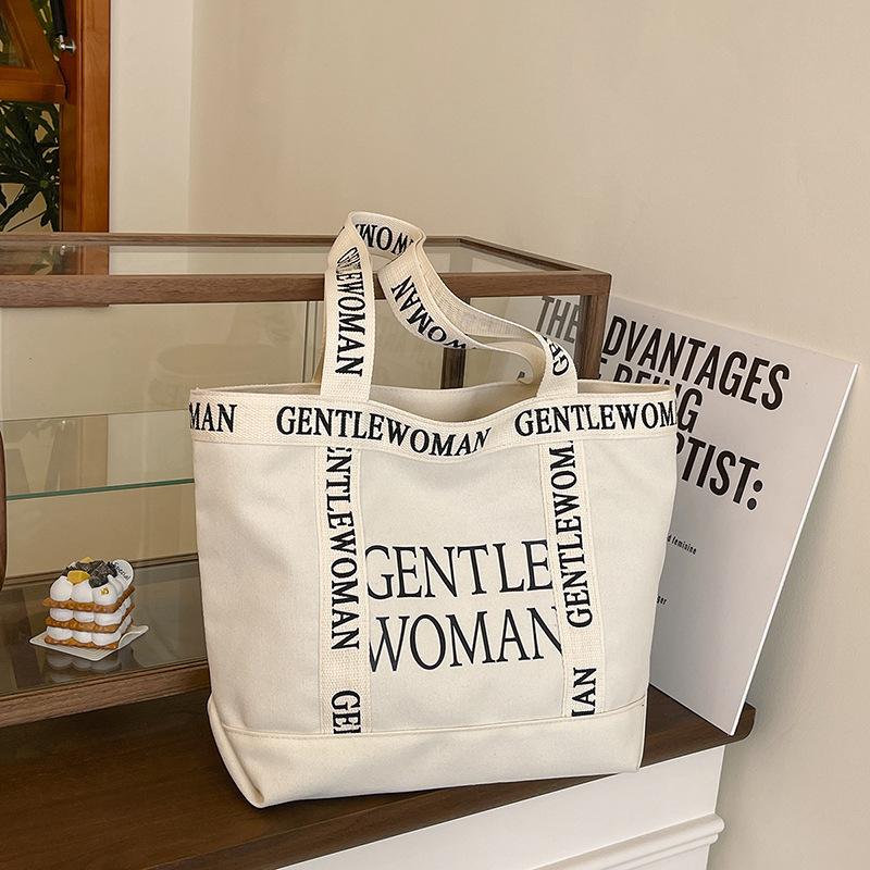 Korean version of fashionable women's bags 2025 new retro student class casual foreign style tote bag shoulder handbag