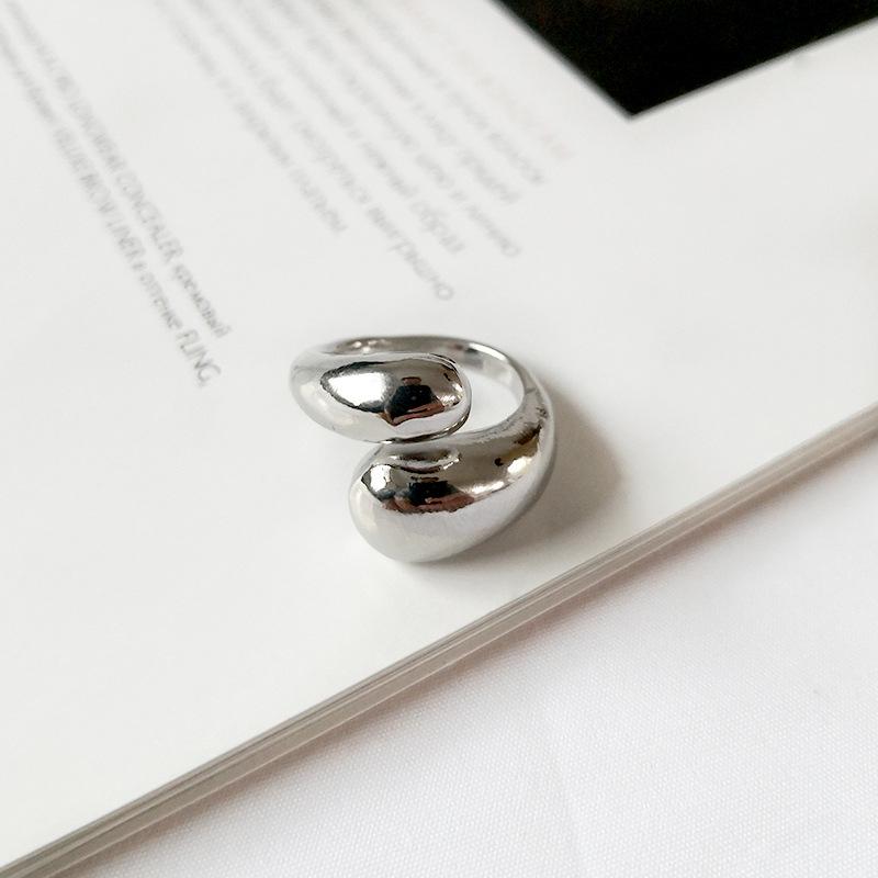 

Модное европейское и американское регулируемое кольцо с перекрестной намоткой серебряный