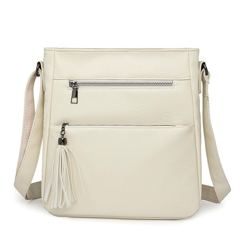 

Женская сумка многокарманная на плечо кроссбоди бежевый