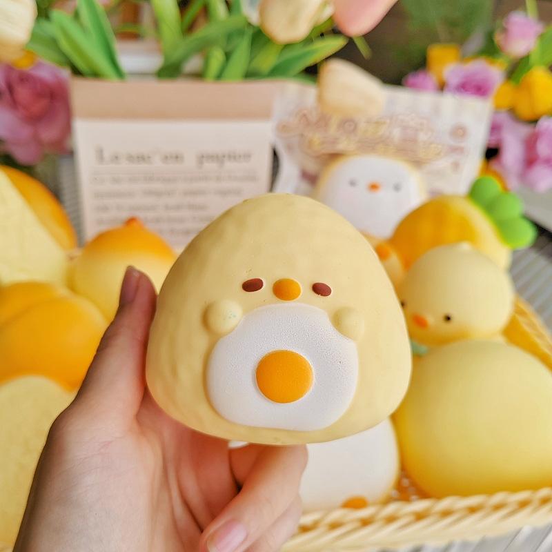 Simulated bread soft and slow-rebounding toy stress relief gadget, "Squeezzy Joy", a cute stress-reducing toy.