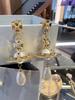 **Empress Dowager Saturn Pearl Earrings - Luxury Fashion Statement**