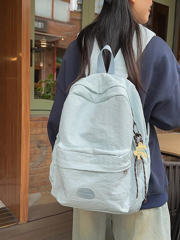 Minimalist Solid Color Backpack For Women And Men With Durable Nylon Material Suitable For Casual Travel And School Use