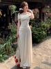 Women's French White Off-Shoulder Top & Knit Midi Skirt Set - Gentle Spring Design