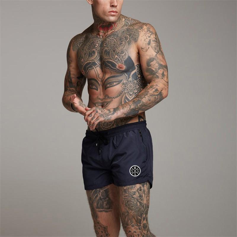 Muscleguys Workout Street Wear Mens Loose Running Shorts Running Hiking Short Jogger Pants