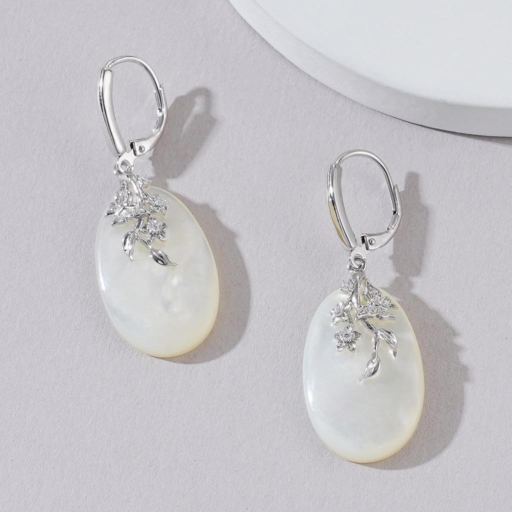 Exquisite Mother-of-Pearl Sterling Silver Luxury Earrings with Unique Face-Inspired Design