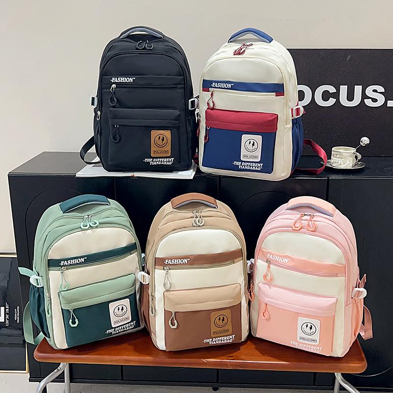 Hot-selling retro tooling wind contrasting color backpack male and female junior high school students versatile tide large-capacity schoolbag