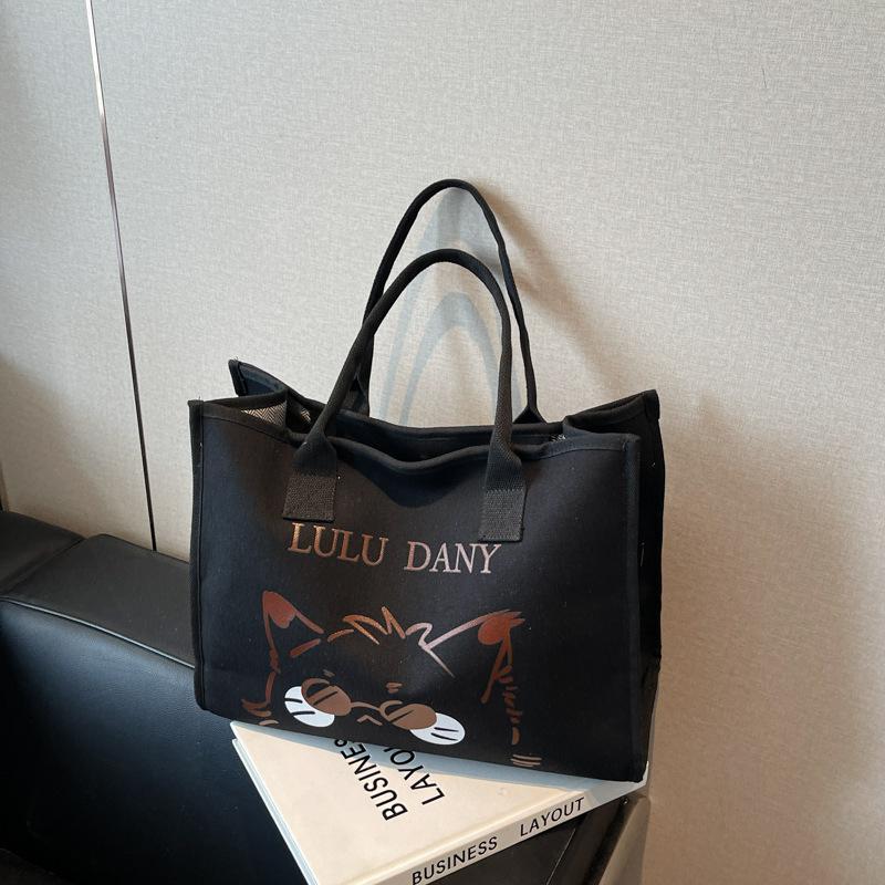 

New large-capacity cartoon printed canvas bag, college student shoulder out shopping tote tote bag чорний