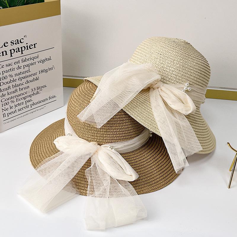 Summer elegant straw woven pearl mesh sunshade straw hat female bow French sunscreen hat seaside bucket hat basin hat