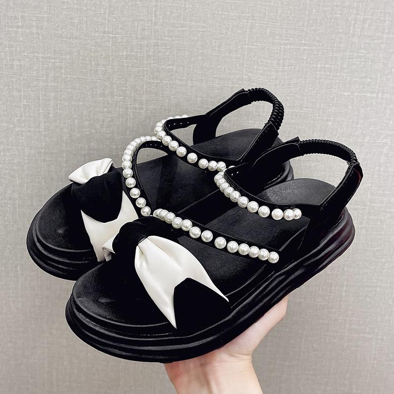 

Летом 2024 года в тренде новые корейские сандалии на толстой подошве, типа «маффин», с жемчугом, римские, модная цветовая гамма, женские. 35 чёрный