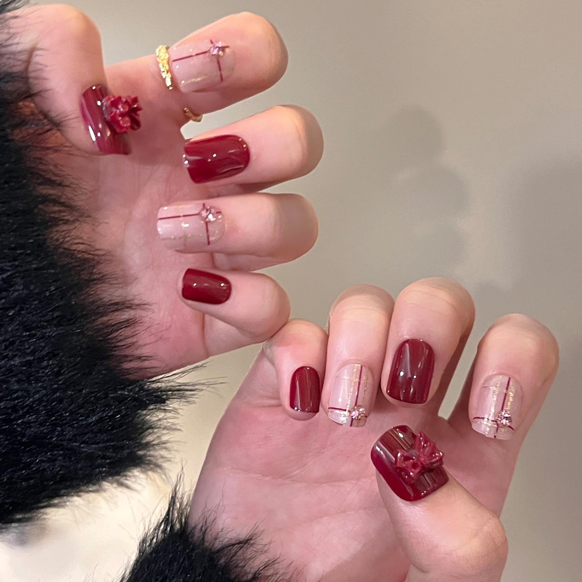 

Red Cross Line Bowknot Nails with Gold Glitter & Rhinestones Glue Version