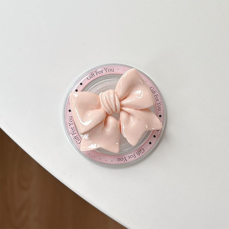 

Solid Color Bow Magnetic Suction Phone Airbag Holder Korean Instagram Style Desktop Retractable Stand Creative Watching TV Shows