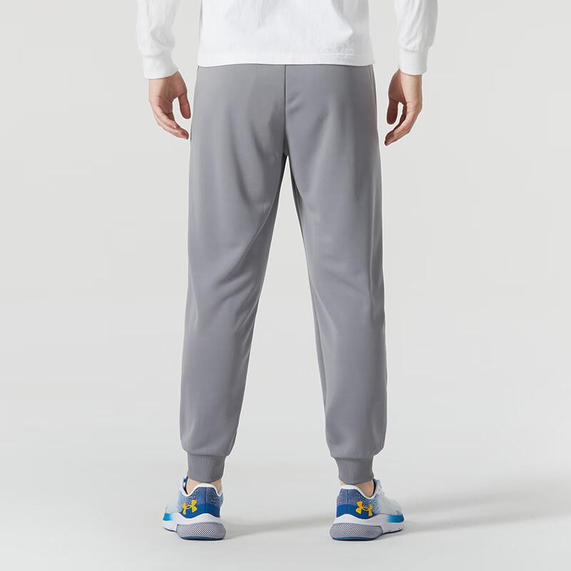 Under Armour Jednobarevný top s kulatým výstřihem a dlouhým rukávem a dlouhé kalhoty středního pasu s manžetami, ležérní sportovní souprava pánské soupravy 22600307-100+23600704-014