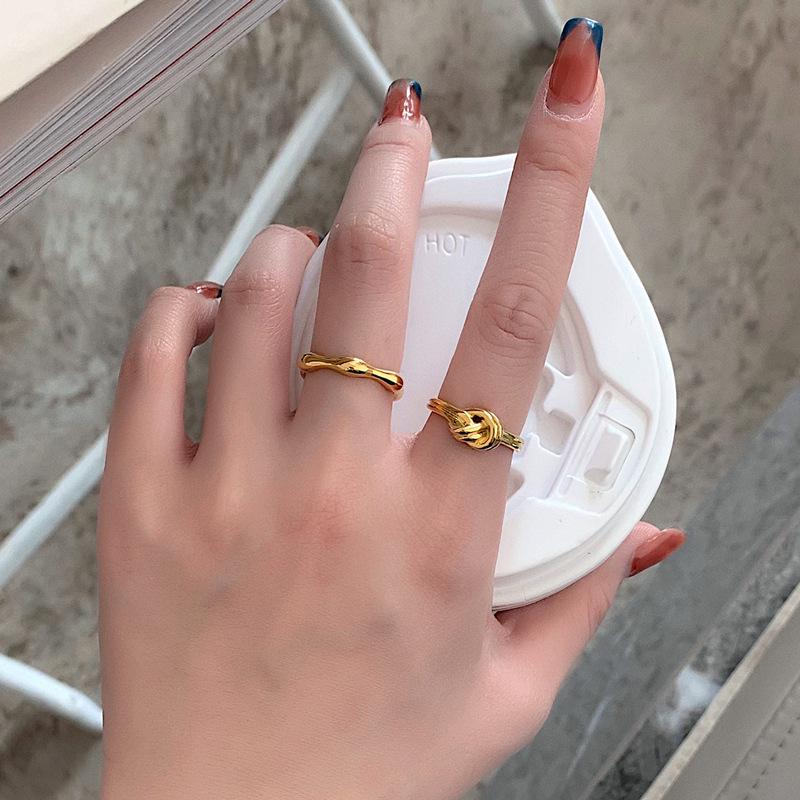 French Designer Titanium Steel Knotted Rope Ring for Women - Fashionable Simple Metal Jewelry