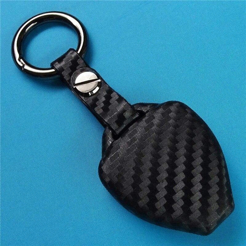 Husa pentru chei de masina din silicon din fibra de carbon pentru Toyota Auris HiLux Corolla Fortuner Prado Verso Camry Yaris Vitz Vios Ractis