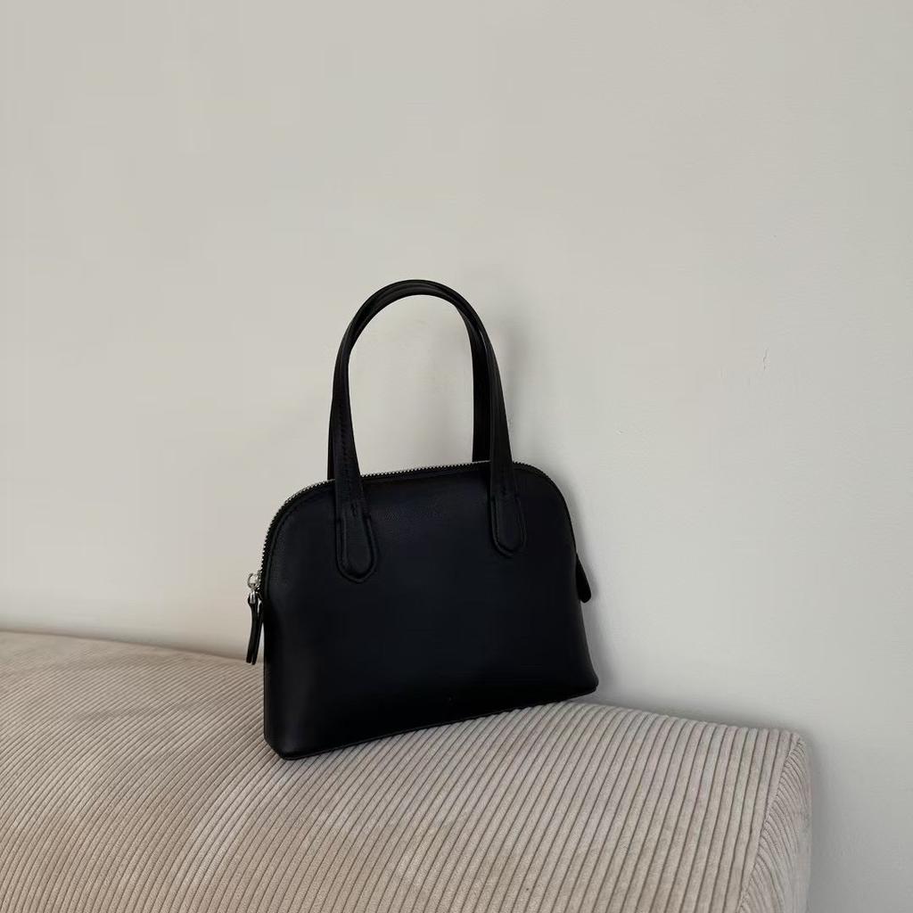 Top-grain cowhide shell bag, a niche high-quality hand-held tote bag, simple, fashionable and versatile crossbody bag