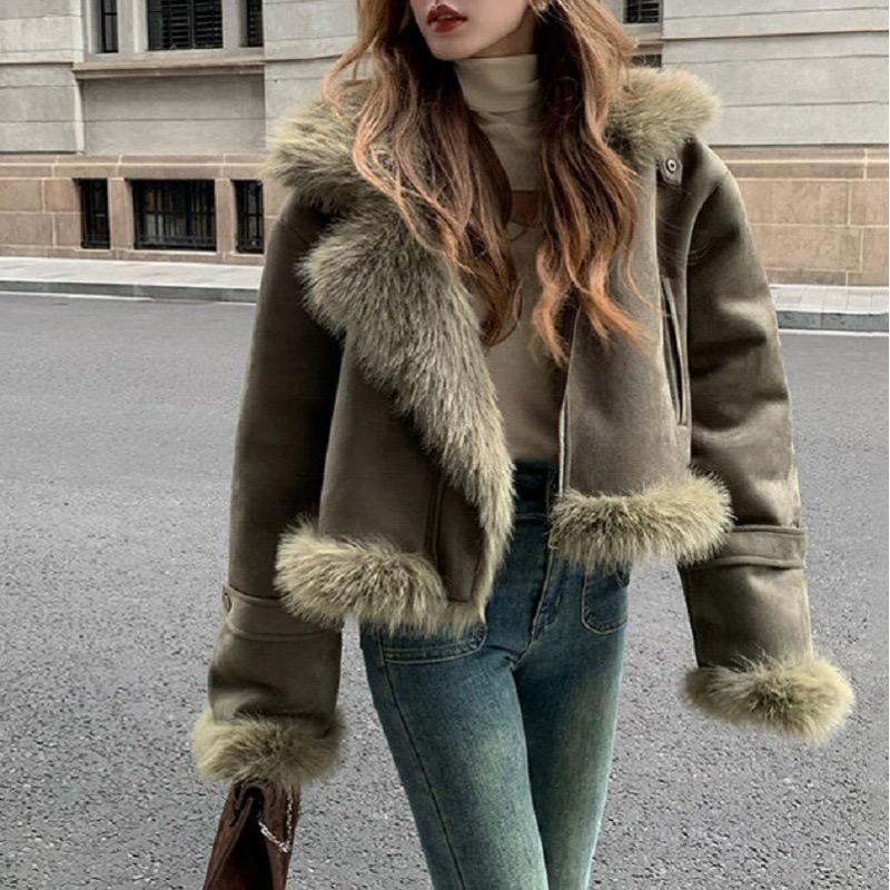 

Жіноча повсякденна куртка на зиму M темно-зелений колір