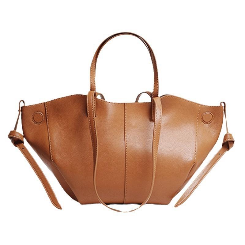 

The first layer of cowhide autumn new large-capacity handbag single shoulder fashion leather women s bag wing tote bag small [42 * 8.5 * 25cm]