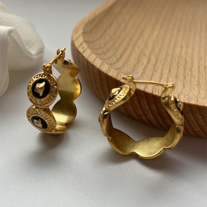 Modische und beliebte mittelalterliche und antike übergroße Ohrringe, personalisierter High-End-Sinn, schwarzer Öltropfen-Ohrschmuck