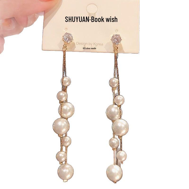 Korean Dongdaemun Long Pearl Fashion Earrings: Elegant Dangle with Versatile Silver Studs