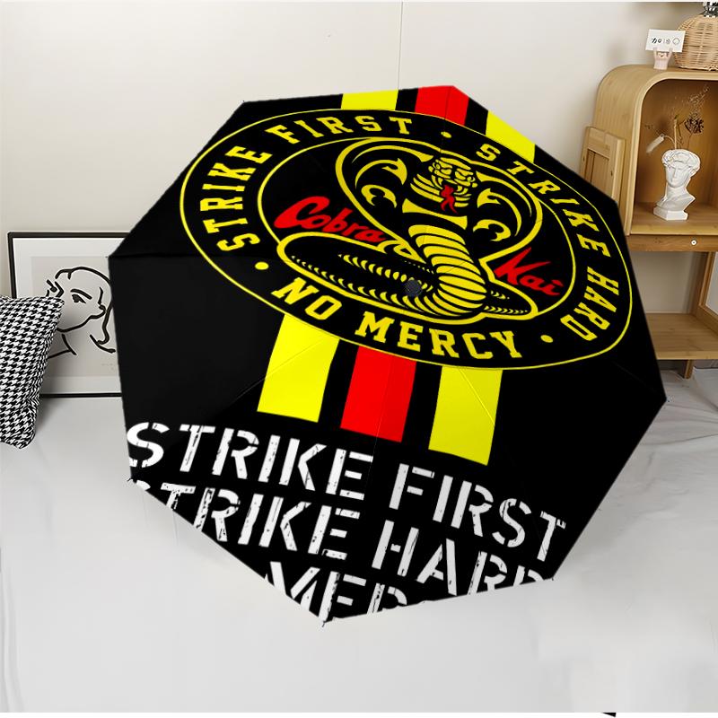 Cobra Kai Fashionable Automatic Opening/Closing Folding Umbrella. Portable and Foldable, Ideal for Gift, Travel, and Daily Use.
