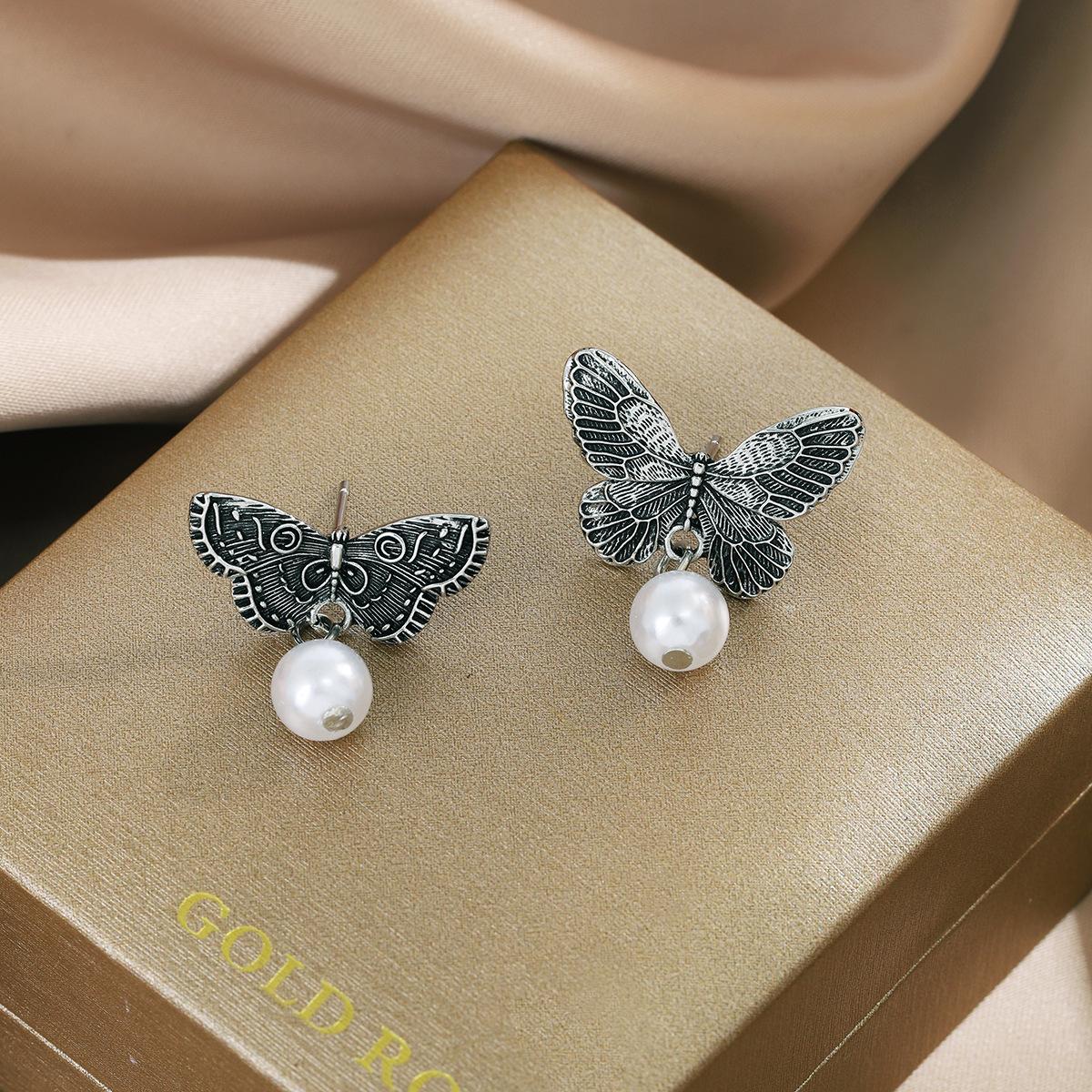 

Винтажные металлические серьги-бабочки с асимметричным дизайном - изысканные и роскошные аксессуары серебряный