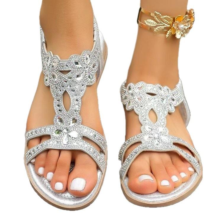 Außenhandel Sommer neue flache Sohle große Größe Strass Blume elastische Fischmaul Sandalen Damen 2025