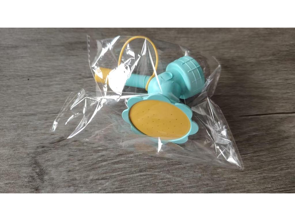 Sunflower Double-Head Watering Bottle: Small Potted Plant Sprinkler with Long Spout for Household Use.