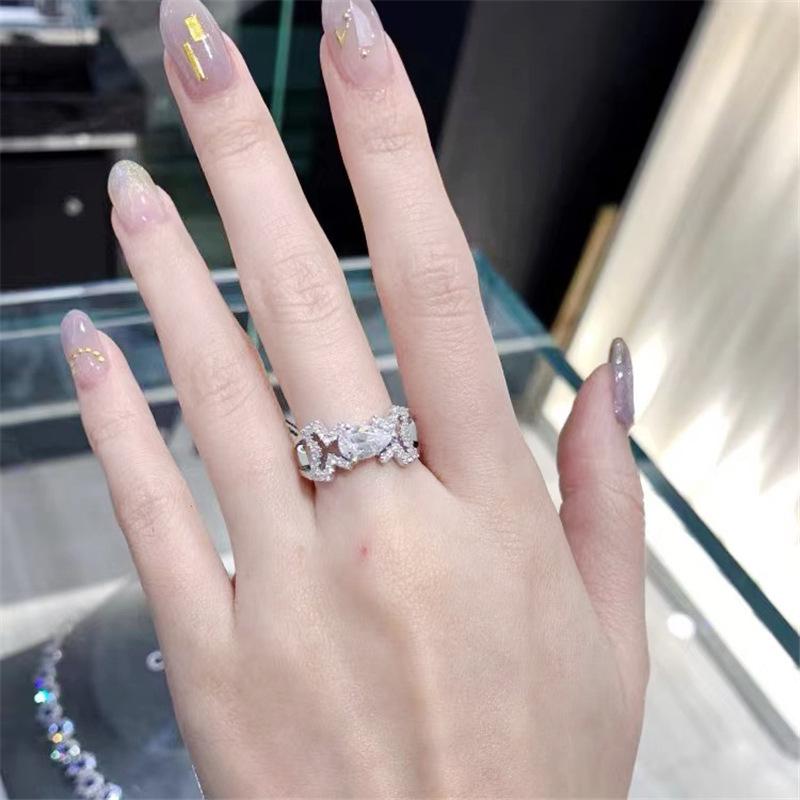 Korean-Style Micro-Paved Diamond Water Drop Ring for Women - Versatile, Fashionable, and Trendy.