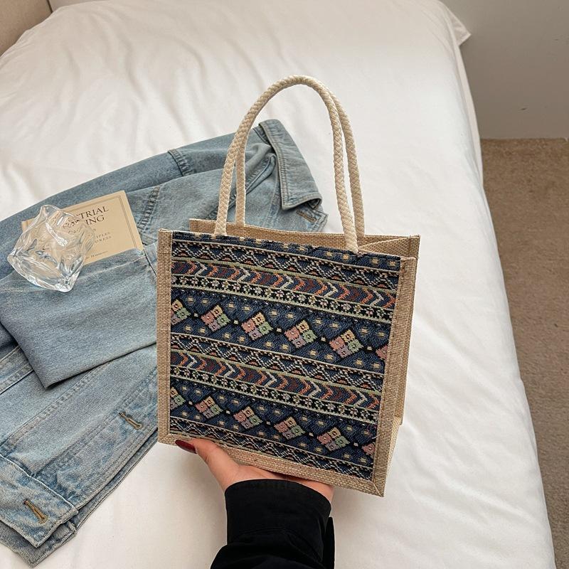 

Нишевая универсальная сумка женская 2025 новая модная наплечная сумка-тоут в этническом стиле, портабельная школьная сумка для студентки