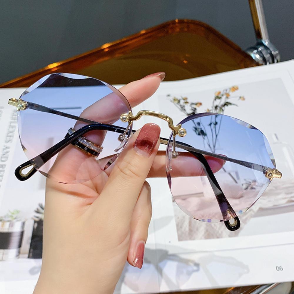 Internet celebrity street shot new polygonal sunglasses women's big face thin marine sunglasses rimless trimmed sunglasses