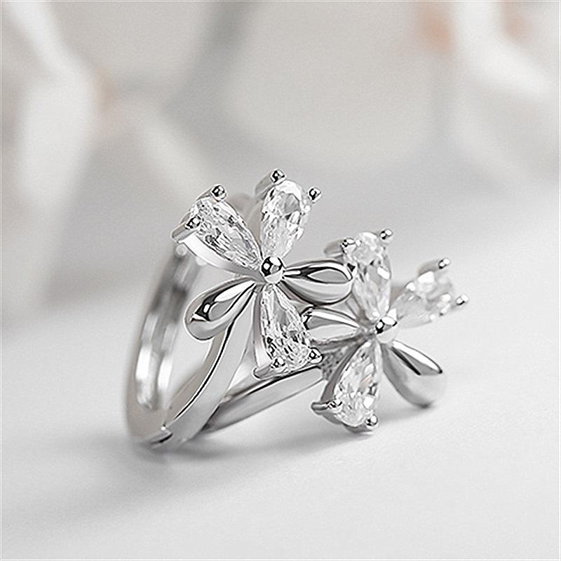 Weihua Plum Blossom Snowflake Crystal Earrings - Korean Fashion Studs for Women, Perfect Christmas or Birthday Gift