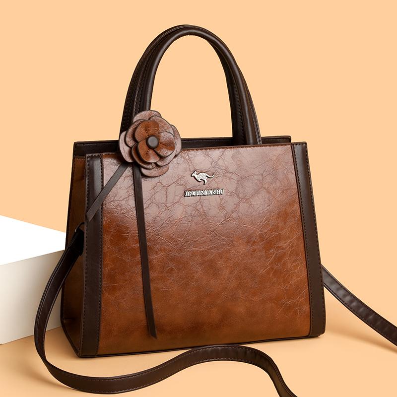 Elegant Faux Leather Tote Bag with Flower Decoration and Adjustable Shoulder Strap