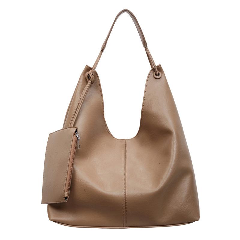 Large Capacity Tote Bag Women's 2026 Spring New Fashion Retro Sense Light Luxury Shoulder Armpit Bag