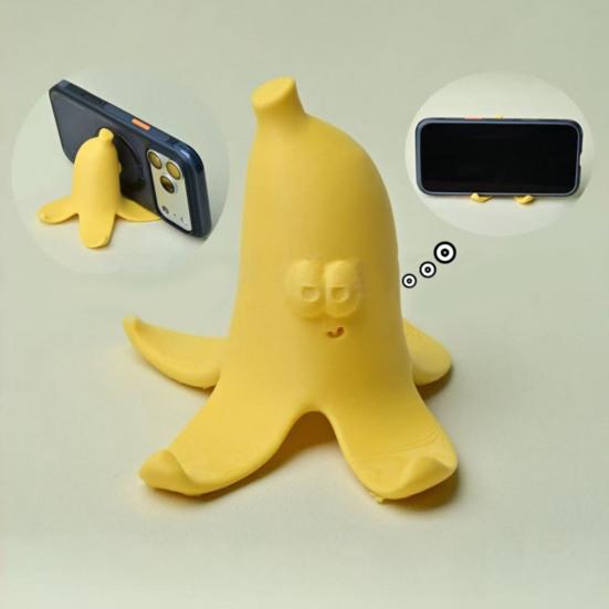 Cute Yellow Banana Peel Phone Holder 3D Printed Funny Banana Desktop Cell Phone Stand for All Mobile Phones
