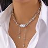 Stacked pearl necklace collection European and American retro baroque special-shaped pearl OT buckle blade snake chain tassel