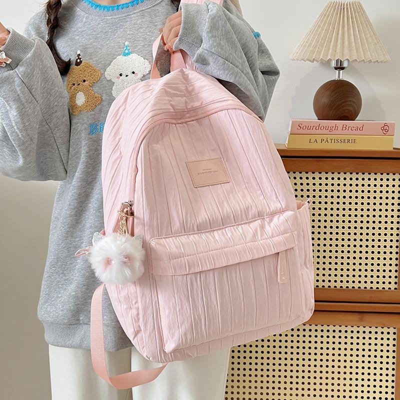 School bag junior high school girls large capacity solid color light primary school backpack high value girl versatile backpack