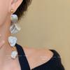 Silver needle irregular geometric shell fringed earrings European and American fashion simple earrings holiday style niche earrings