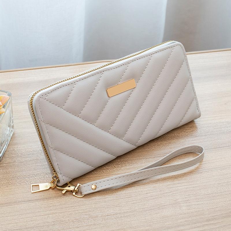 Women's Long Single-pull Wallet, New Twill Embroidered Iron Sheet, Clutch Change Bag, and a Casual Bag.