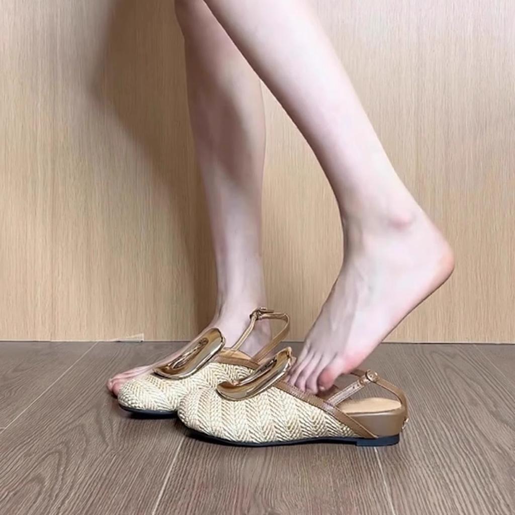 Sheepskin version~ niche personalized design sense straw woven vacation wind bag head shoes women's rear strap hollow wedge half slippers