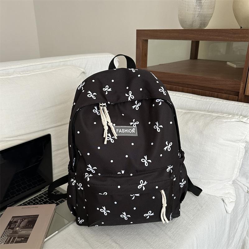 

Small fresh printed schoolbag high school college student college style girl backpack high value large capacity backpack чорний