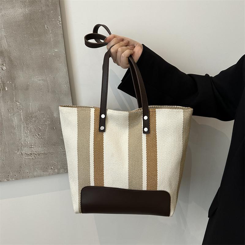 Simple Vertical Stripe Large-capacity Handbag Women's Korean Version New Casual Fashion Niche Versatile Lightweight Shoulder Bag