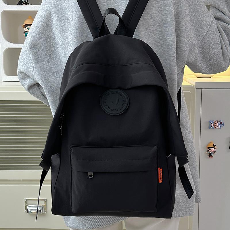 Stylish simple large-capacity couple student schoolbag new junior high school high school student backpack fashion