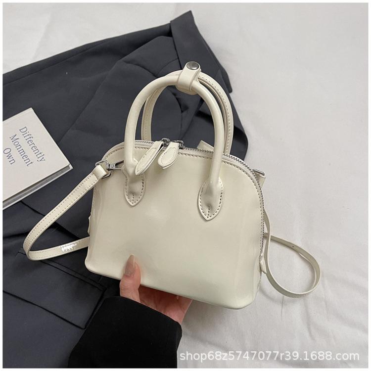 

Casual retro bowling bag women s 2025 autumn and winter new fashion versatile shoulder bag niche design messenger bag білий