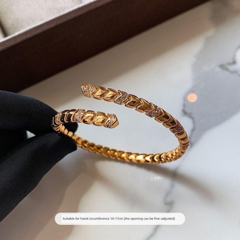 

and American Style Gold-Plated Zircon Snake-Shaped Bracelet for Women, Light Luxury, Niche, Exquisite, High-End, Elastic Open-Ended Stackable Bracelet Gold