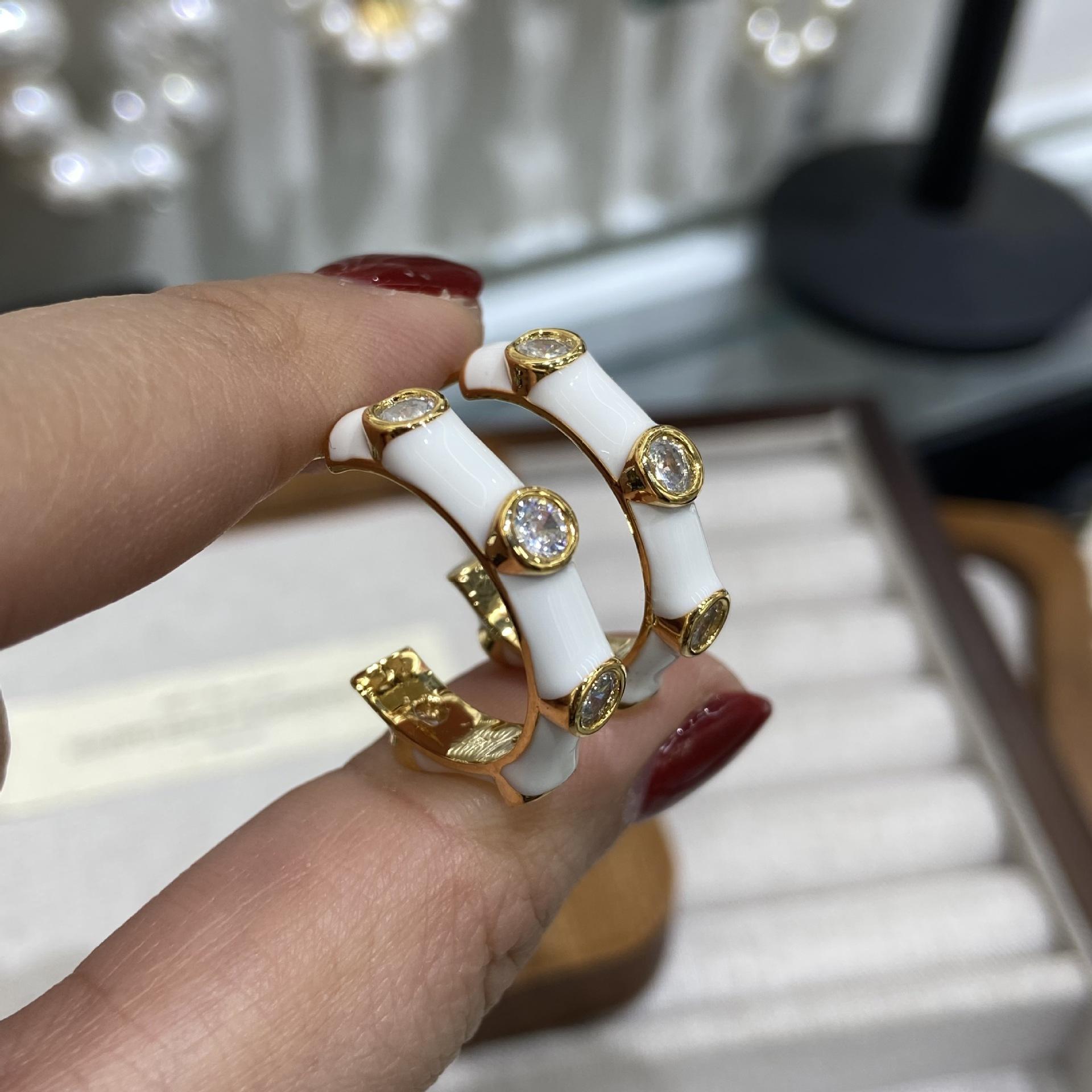 

Stylish White Drip Oil Micro-Set Zircon Earrings Bamboo White Earrings Piercing Earrings