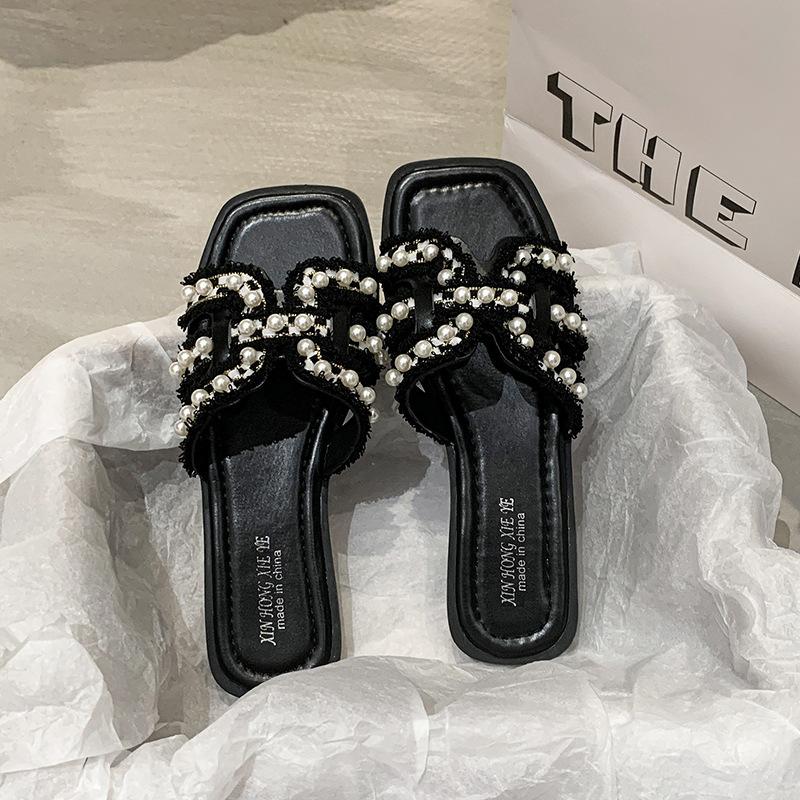 

2025 summer new Xiaoxiangfeng flat-bottomed slippers women wear large size light luxury fairy versatile pearl vacation sandals 43 чёрный