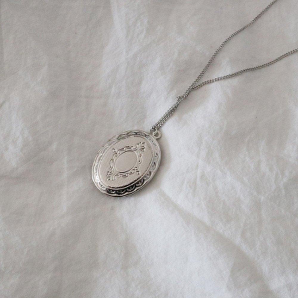 Silver round locket necklace with photo insert opening
