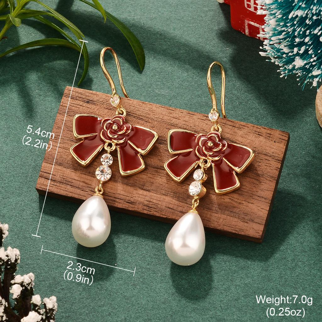 French bow New Year's pearl autumn and winter silver needle burgundy Christmas series earrings niche high-end personalized earrings