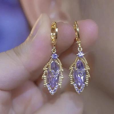 Luxurious Gold Leaf-Shaped Earrings with Purple Crystal