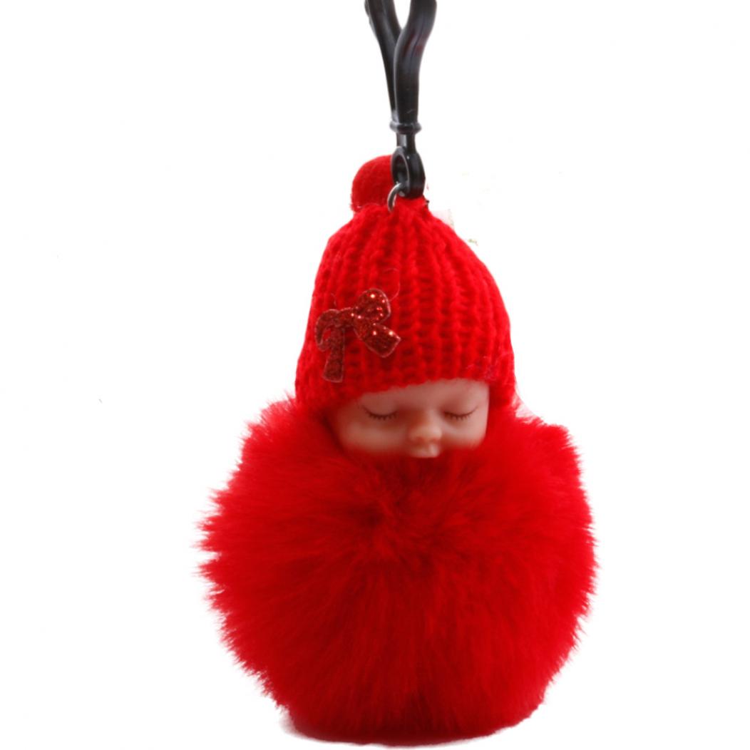 

Брелок в виде спящего ребёнка в помпоне красный